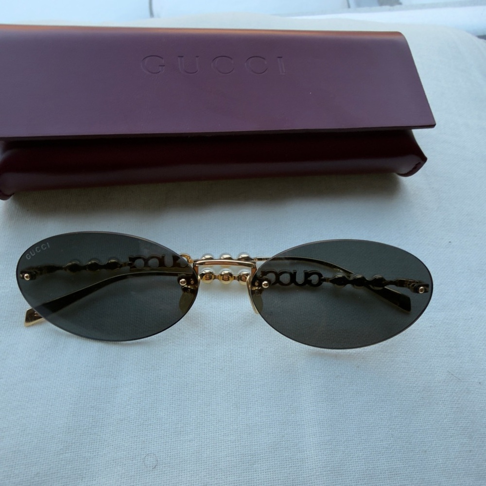 Gucci Black and Gold Sunglasses